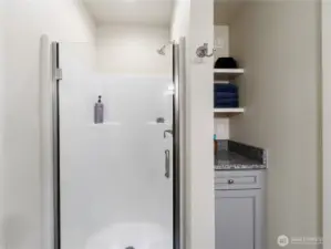 Studio 3/4 bath with linen storage