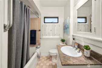 Updated bathroom with tub/shower combo.
