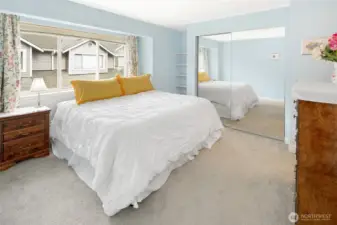 Upper level primary bedroom fits a king sized bed.