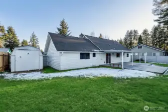 Back yard with large storage shed