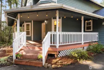 Covered country porch is a great place to sit and relax at the end of the day.