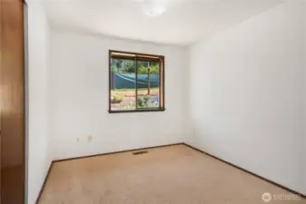 3rd bedroom, across from the bathroom.
