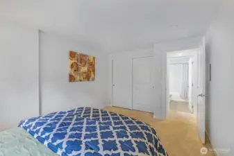 Alternate perspective highlights the second bedroom’s full-length closet and convenient hall-bath access, underscoring the smart use of every square foot in this 930 SF home.