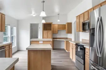 Large open kitchen with plenty of light and large windows.