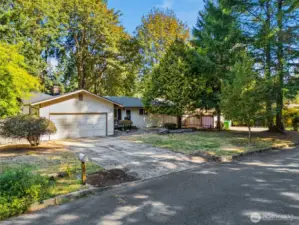 Welcome to 2510 17th Avenue NW in Olympia! Front of home shows the lovely trees surrounding this amazing home! Located on a quiet dead-end street, you'll see your new neighbors out enjoying the neighborhood. Front of home faces south.
