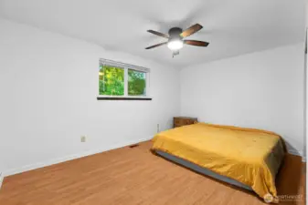 Primary bedroom (unstaged). Mattress shown is king size-yes, this room is that large!