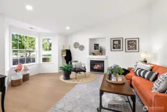 Enter the main living room that has brand new LVP flooring and interior paint.