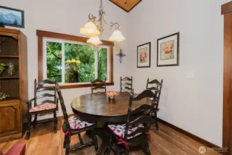Dining area looks over creek