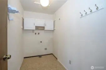 Large laundry room off of kitchen