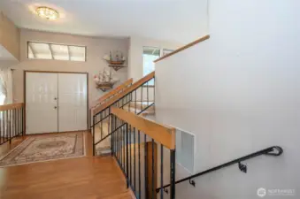 Stairway to garage and living room