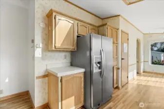 Kitchen with large walk-in pantry.