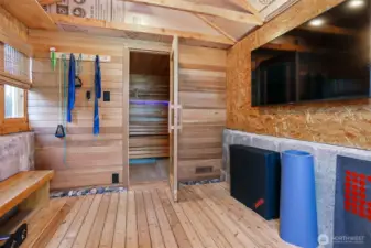 This unique space is hidden from plain site.  Detached from the main house, you enter through the Greenhouse into your own personal Yoga room and Sauna!