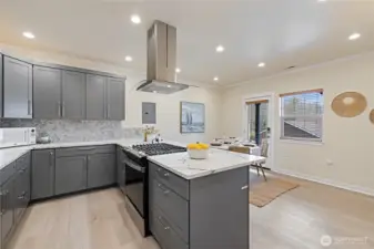 The door straight ahead to the right is access to covered parking and a covered patio.