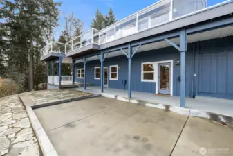 This is the allocated parking area for the lower unit. Straight ahead is the entrance & covered patio