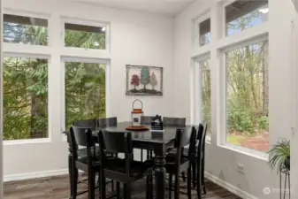 Eating space with a wall full of windows