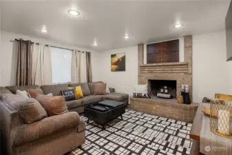 Wood burning fireplace in living room