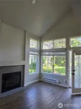 living room with vaulted ceilings