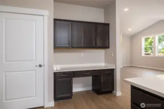 This home has a built in desk and pantry