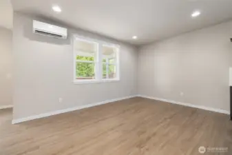 The dining room can hold a long table, if needed and has wall space for a hutch or piano.