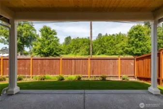 There's a covered patio off the back of this home.