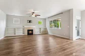 Living Room w/ Gas Fireplace & Built-ins