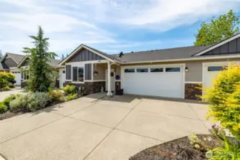 This townhome is one level and has a two car garage with lots of parking.