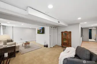 Down the hallway to the right leads to the third bedroom, which connects to the basement bathroom.