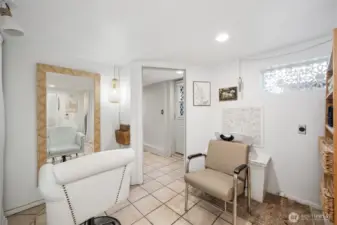 Downstairs in the basement, with the exterior door leading to the backyard.