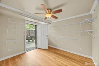 Third bedroom with door to courtyard.  Previously used as sewing room.