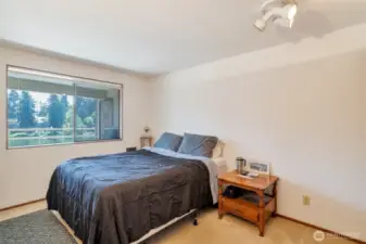 Bedroom one with lake view.