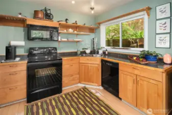 Full sized kitchen with lots of storage space.