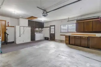 nice sized garage with storage and laundry