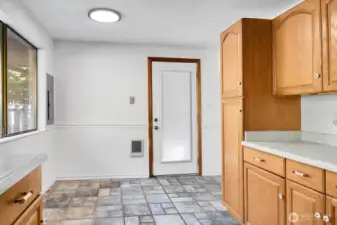 Door straight ahead leads to carport and backyard.
