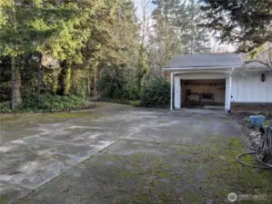 1 car attached garage. Drive thru driveway. Welcome to #11214 34th Ave E, Tacoma WA 98446. 3200+sf, 4+ br, 3 ba, 1.1 fenced acres.