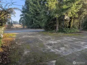 Drive thru driveway entrance. Welcome to #11214 34th Ave E, Tacoma WA 98446. 3200+sf, 4+ br, 3 ba, 1.1 fenced acres.