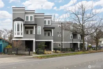 This end unit townhouse is flooded with light & offers the ultimate in urban living with no HOA fees!