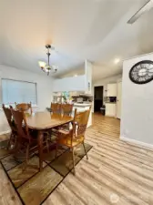 Dining area connects to kitchen.