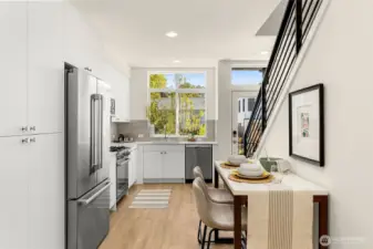 Elegant dining nook framed by natural light — the perfect setting for morning coffee or cozy dinners at home.