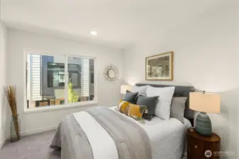 Secondary bedroom offering flexibility as a guest suite, cozy den, or personal sanctuary.