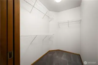 The walk-in primary closet will hold all your wardrobe.