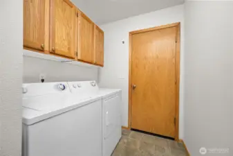 You'll find the laundry room just off the garage.