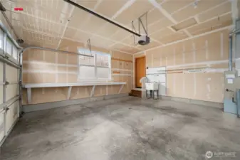 Two car garage is clean and spacious.