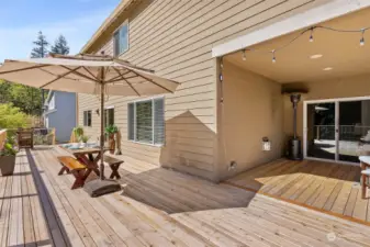 Enjoy meals outside or lounging with a book.  To the right is the private deck off the home office.
