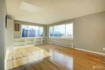 Spacious living room with built in shelves.