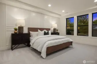 Designer primary suite with five-piece bath with heated floors