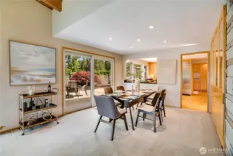 Dining area is flanked by the living room & the kitchen.  Nice built in is on the right.