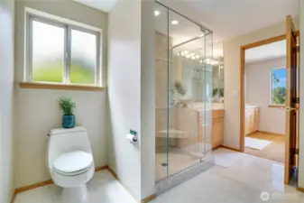 Primary suite showing both vanities & shower.