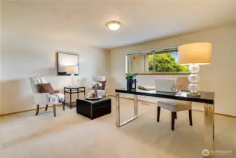 One of the two bedrooms downstairs staged as an office.