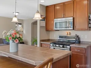 Island w/ eating space great for breakfasts, entertaining or homework