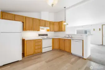 The open floor plan allows for a roomy kitchen, and it comes with all these appliances you see here!